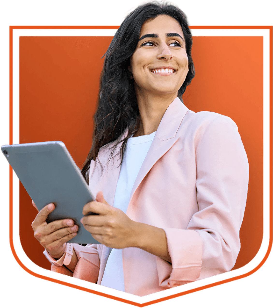 A smiling woman with long dark hair holds a tablet in both hands.
She is wearing a light pink blazer and a white top, standing against an orange shield-shaped background.