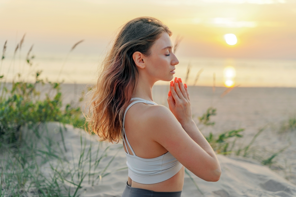 Woman outside meditating