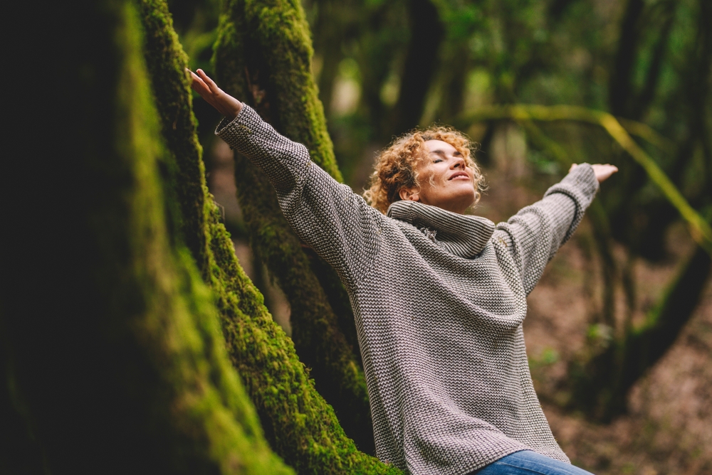 A smiling woman outdoors