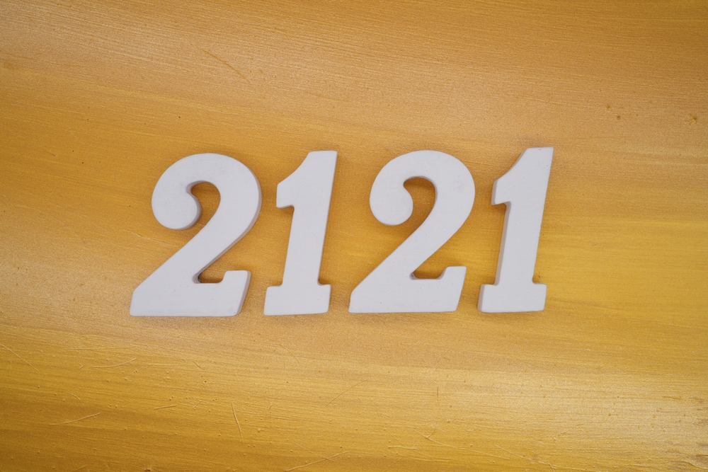 2121 written in white on a gold background