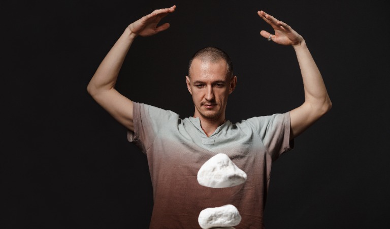 Man levitating stones